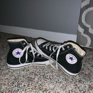 Black and White hightop Converse